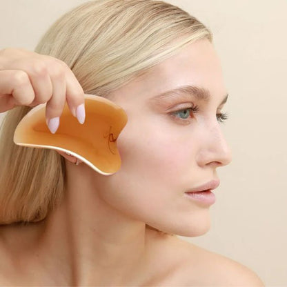 Gua_sha_pierre_en_résine_lisse_joue