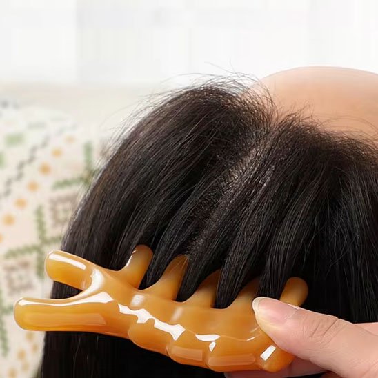 Gua_sha_pierre_en_résine_peigne