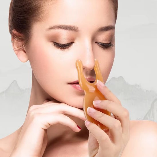 Gua_sha_pierre_en_résine_sculpte_nez