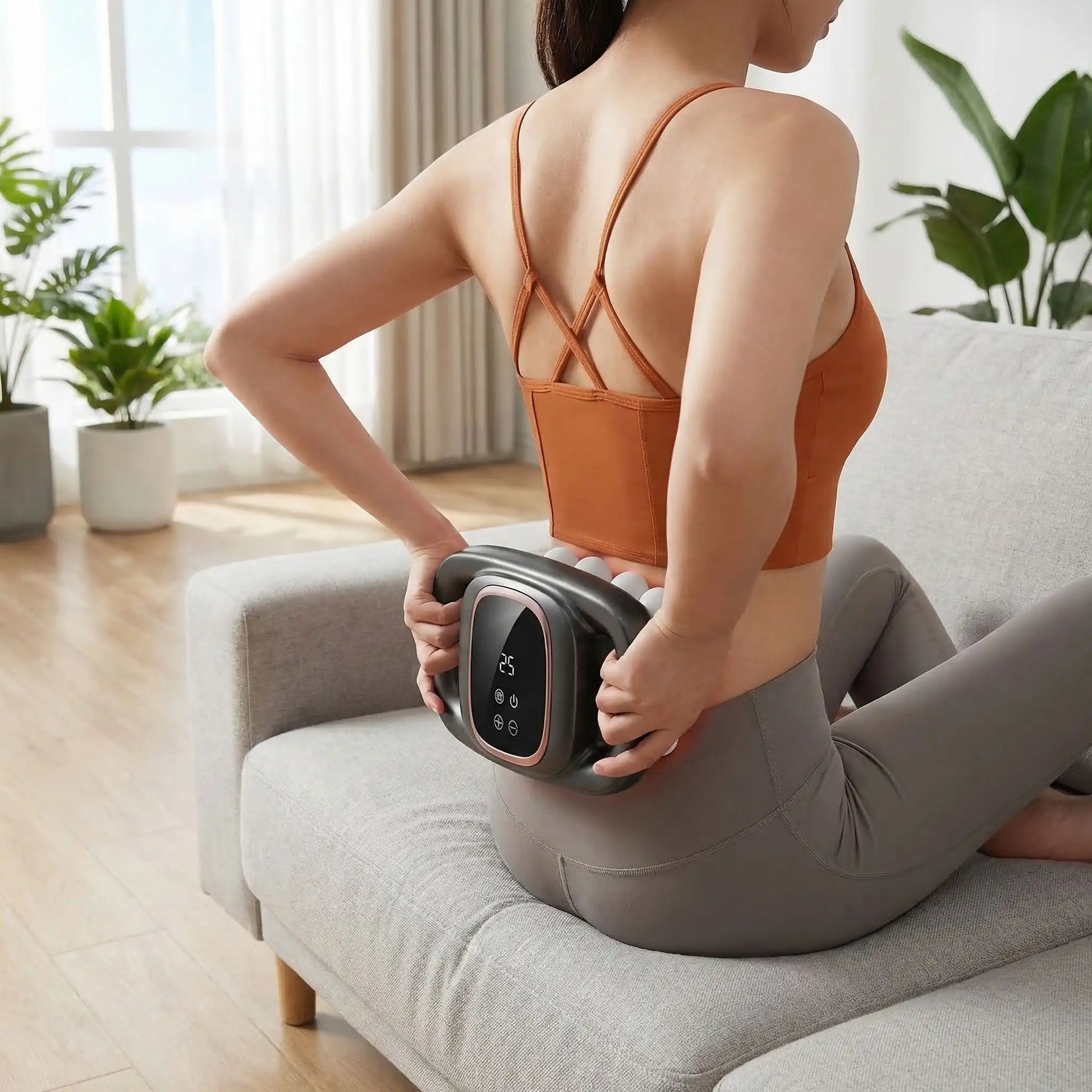 Pistolet de massage musculaire bas du dos